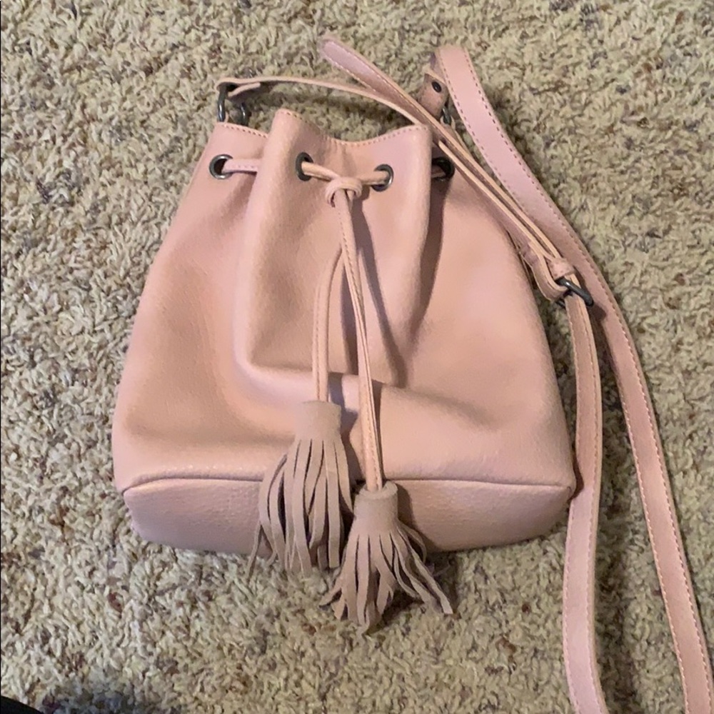 Blush pink bucket purse.